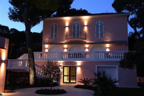 Pillar lights lighting exterior of villa